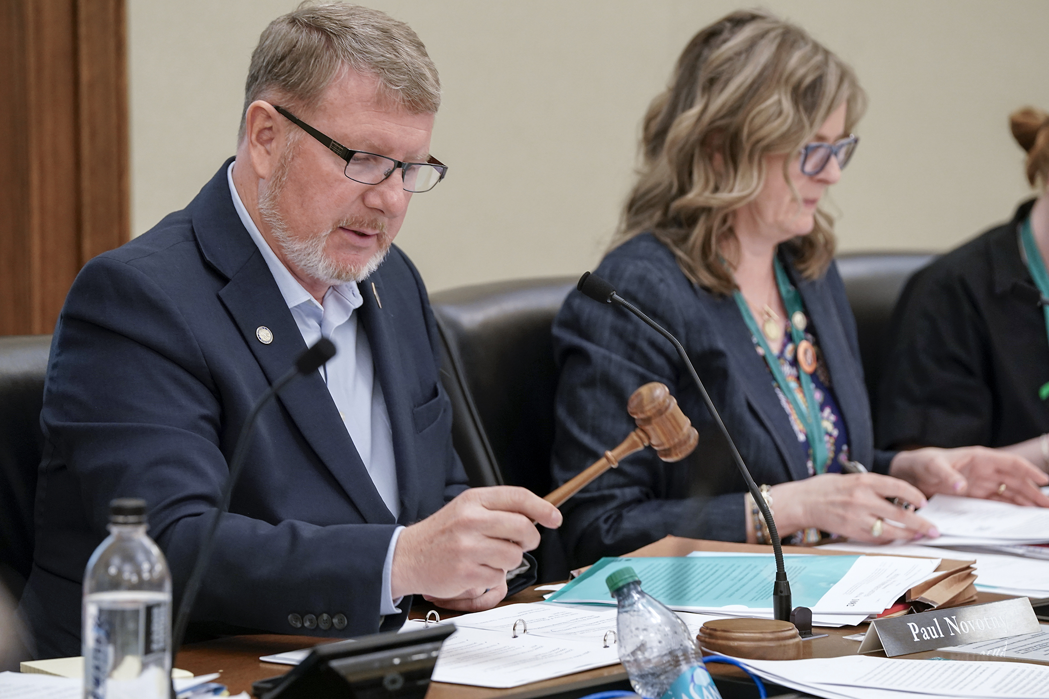 House Public Safety Finance and Policy Committee co-chairs Paul Novotny and Kelly Moller work on passing amendments to HF1082, the public safety finance and policy supplemental appropriations bill, during a Wednesday meeting. (Photo by Michele Jokinen)